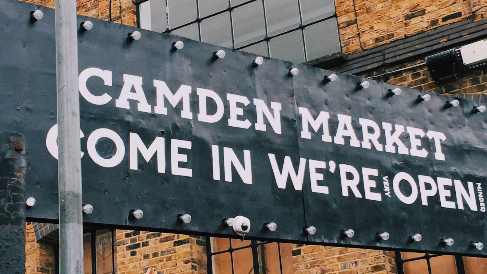 Camden Market street art and neon signs along the canal in London