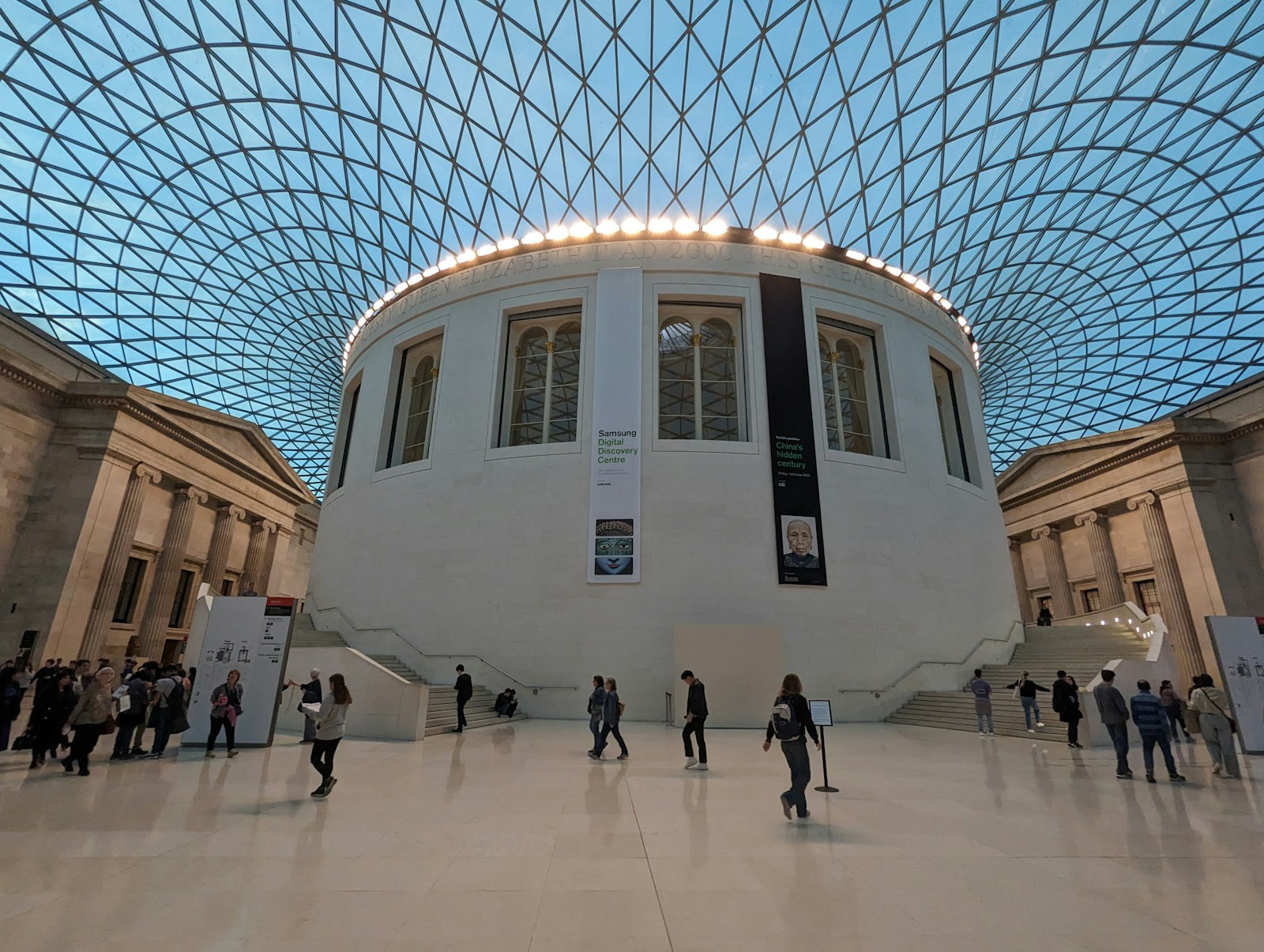 Students and visitors beneath the glass roof of the British Museum Great Court in London