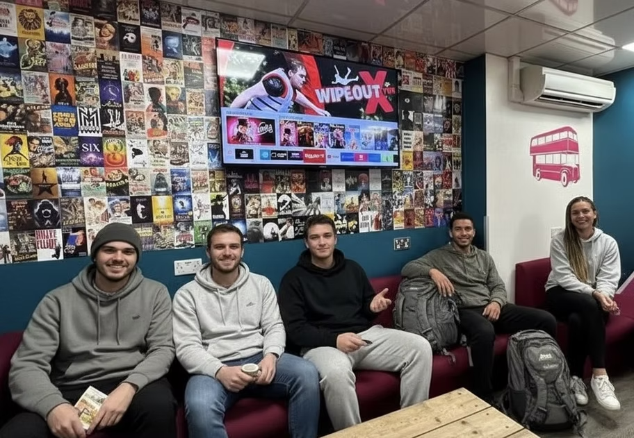 TV lounge with movie poster wall